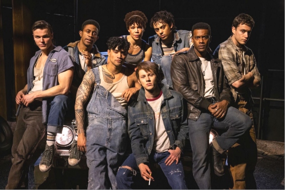 01b The Greasers l. to r. Jason Schmidt Renni Anthony Magee Daryl Tofa Tilly Evans Krueger Sky Lakota Lynch Joshua Boone Brent Comer front Brody Grant